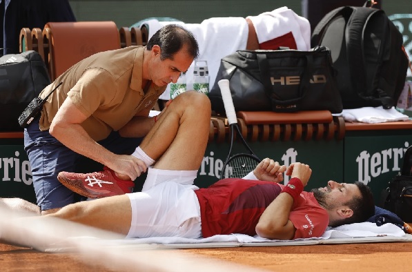 Novak Djokovic received medical assistance for his right knee during his fourth round match the French Open against Argentina's Francisco Cerundolo Novak Djokovic received medical assistance for his right knee during his fourth round match the French Open against Argentina's Francisco Cerundolo