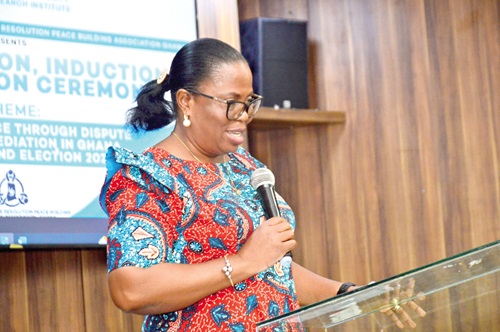 Mercy Larbi, Deputy Commissioner of CHRAJ, speaking at the event