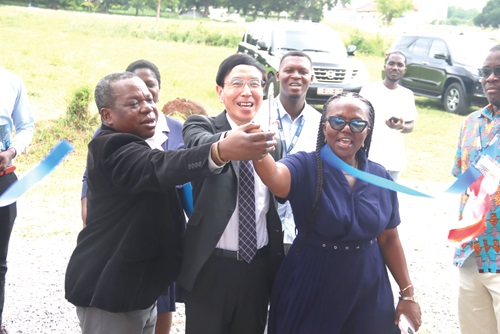  Mochizuki Hisanobu (middle), Japanese Ambassador to Ghana, being assisted by Prof. Dorothy Yeboah-Manu (right), Director, Noguchi Memorial Institute for Medical Research, and Prof. Julius Fobil (left), Provost College of Health Sciences, University of Ghana, to commission the new Incinerator at the Noguchi Memorial Institute for Medical Research. INSET: The new Incinerator. Picture: ELVIS NII NOI DOWUONA