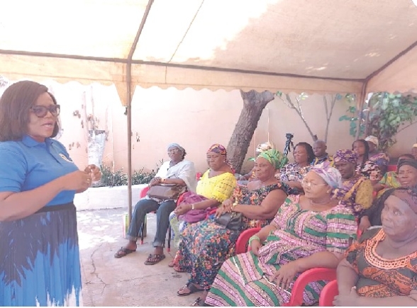 Akosua Danquah Ntim-Sekyere, “See Something Say Something” campaign Team Lead, interacting with the market queens Akosua Danquah Ntim-Sekyere, “See Something Say Something” campaign Team Lead, interacting with the market queens
