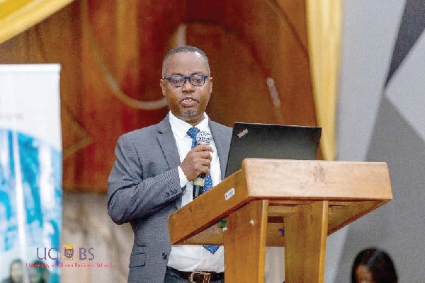 Philip Amoabeng — Director, Telecel Cash & Digital Transformation, addressing the audience at the UGBS Build Ghana’s financial resilience through FinTech — Expert