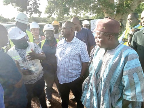 Francis Asenso-Boakye (left), Minister of Roads and Highways, interacting with journalists at the project site Francis Asenso-Boakye (left), Minister of Roads and Highways, interacting with journalists at the project site