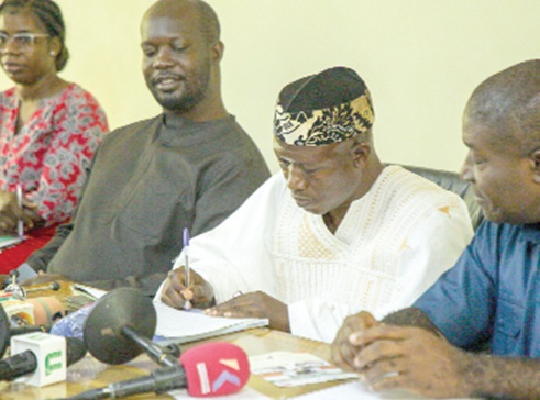 Dr Mumuni Seidu (2nd from right), Managing Director of Muus International Ltd, signing the MoU while Nana Akomea (right), Managing Director of the State Transport Corporation, looks on. Picture: CALEB VANDERPUYE Dr Mumuni Seidu (2nd from right), Managing Director of Muus International Ltd, signing the MoU while Nana Akomea (right), Managing Director of the State Transport Corporation, looks on. Picture: CALEB VANDERPUYE