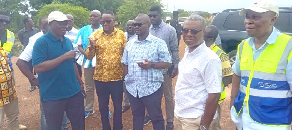 Francis Asenso-Boakye (3rd from right), Minister of Roads and Highways, in a discussion with other officials while inspecting the Kulaa Bridge in Bolgatanga