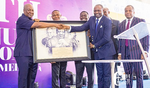Rev. Andrews Nelson Awintia (2nd from right), Greater Accra East Regional Superintendent, Assemblies of God, Ghana, presenting a wall painting to John Dramani Mahama. With them is Rev. Dr Stephen Wengam (right), General Superintendent of the Church Rev. Andrews Nelson Awintia (2nd from right), Greater Accra East Regional Superintendent, Assemblies of God, Ghana, presenting a wall painting to John Dramani Mahama. With them is Rev. Dr Stephen Wengam (right), General Superintendent of the Church