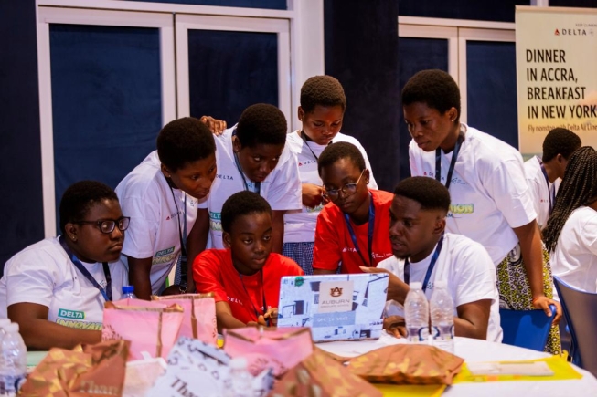 Some girls at the booth camp being taken through training