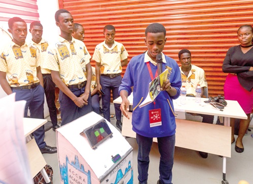 A member of the Accra Academy Robotic Club explaining the invention project at the Tech Expo at the Academic City University College in Accra A member of the Accra Academy Robotic Club explaining the invention project at the Tech Expo at the Academic City University College in Accra