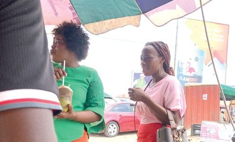 Some customers enjoying the fruit