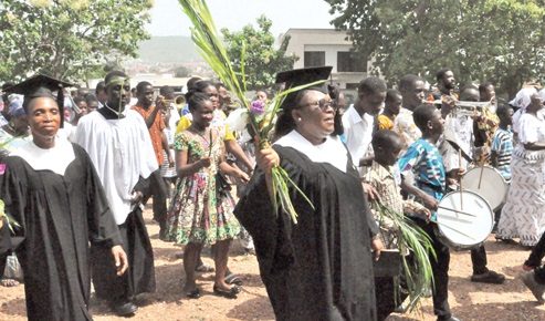 Members of the congregation at the Dela Cathedral of the E.P. Church, Ghana in a pocession  