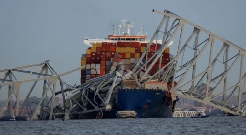 As dawn broke the ship was seen tangled up in the remains of the bridge Baltimore Francis Scott Key Bridge collapse: What we know about ship and bridge