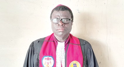 Rt. Rev. Dr Emmanuel Kwadwo Asare-Kusi (right), Bishop of the Koforidua Diocese of the Methodist Church, addressing the 45th synod of the church at Asokore, Eastern Region 