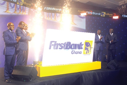 Victor Yaw Asante (right), Chief Executive Officer, FBNBank Ghana, with Dr Mohammed Amin Adam (2nd from right), Minister of Finance, Olisegun Alebiosu (left), acting FirstBank Group Chief Executive Officer, and Dr Ernest Addison (2nd from left), Governor, Bank of Ghana, jointly unveiling the new logo of FirstBank in Accra. Picture: ESTHER ADJORKOR ADJEI Victor Yaw Asante (right), Chief Executive Officer, FBNBank Ghana, with Dr Mohammed Amin Adam (2nd from right), Minister of Finance, Olisegun Alebiosu (left), acting FirstBank Group Chief Executive Officer, and Dr Ernest Addison (2nd from left), Governor, Bank of Ghana, jointly unveiling the new logo of FirstBank in Accra. Picture: ESTHER ADJORKOR ADJEI