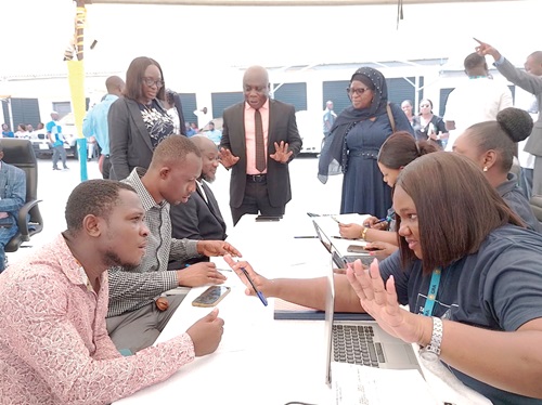 Charles Essandoh Mensah (standing middle), Manager of the Kimbu Public Sector Tax Office, and some officials of GRA interacting with some taxpayers Charles Essandoh Mensah (standing middle), Manager of the Kimbu Public Sector Tax Office, and some officials of GRA interacting with some taxpayers