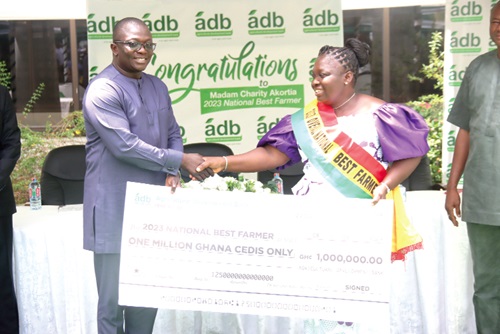 Dr Bryan Acheampong (left), Minister of Food and Agriculture, presenting a dummy cheque to Charity Akortia (right), National Best Farmer 2023. Picture: ELVIS NII NOI DOWUONA Dr Bryan Acheampong (left), Minister of Food and Agriculture, presenting a dummy cheque to Charity Akortia (right), National Best Farmer 2023. Picture: ELVIS NII NOI DOWUONA
