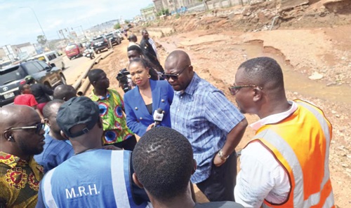 Francis Asenso-Boakye (2nd from right), Minister of Roads and Highway, engaging with the media after the inspection Francis Asenso-Boakye (2nd from right), Minister of Roads and Highway, engaging with the media after the inspection