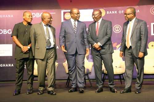 Vice-President Dr Mahamudu Bawumia (2nd from right) interacting with Dr Ernest Addison (3rd from left), Governor of the Bank of Ghana, after the morning session of Day Two of the 3i Africa Summit in Accra. With them are Dr Maxwell Opoku-Afari (right), First Deputy Governor, Bank of Ghana, and other stakeholders. Picture: SAMUEL TEI ADANO Vice-President Dr Mahamudu Bawumia (2nd from right) interacting with Dr Ernest Addison (3rd from left), Governor of the Bank of Ghana, after the morning session of Day Two of the 3i Africa Summit in Accra. With them are Dr Maxwell Opoku-Afari (right), First Deputy Governor, Bank of Ghana, and other stakeholders. Picture: SAMUEL TEI ADANO