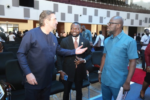 Daniel Krull (left), German Ambassador to Ghana interacting with Prof. Ernest Kofi Abotsi (right), Dean, UPSA Law School, at the opening of the Future of African Trade Conference in Accra. With them is Duke Aaron Sasu, Project Lead, Africa Chamber of Trade and Investment. Picture: SAMUEL TEI 