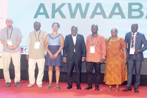 President Akufo-Addo (middle), Diane Dumashie (3rd from left), President Ghana Institute of Surveyors; Samuel Larbi Darko, President, Licensed Surveyors Association of Ghana, and  Dr Anthony Arko-Adjei, President, Ghana Institution of Surveyors, with other dignitaries at the event. Picture: ESTHER ADJORKOR ADJEI