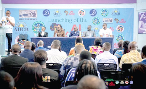 Prof. Hugh K. Aryee (extreme left), Vanuatu Trade Commissioner, stressing a point at the launch 