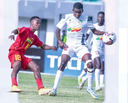 • Black Starlets' Mark Kagawa Mensah (left) battles with Achirafou Sabam of Benin during the game • Black Starlets' Mark Kagawa Mensah (left) battles with Achirafou Sabam of Benin during the game
