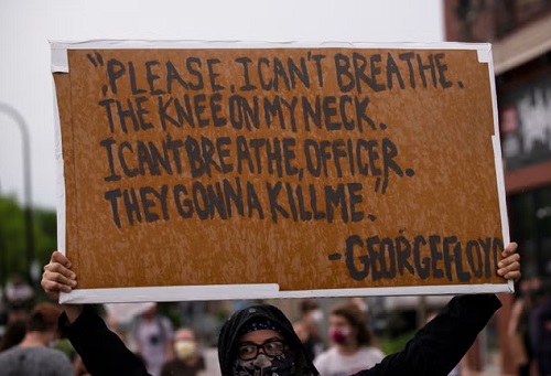 Protester outside the Minneapolis police department days after the murder of George Floyd (Getty Images)