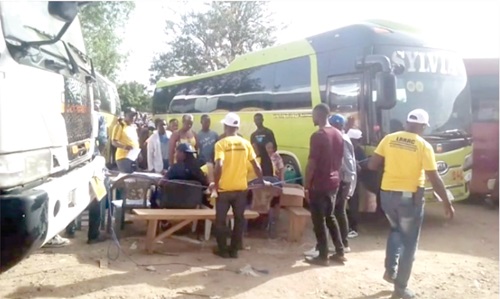 Some of the Liberians preparing to board the bus Some of the Liberians preparing to board the bus