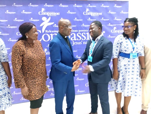 Rev. Enoch Thompson (2nd from left), Executive President of the Ghana Baptist Convention, in a chat with Kobina Yeboah Okyere, National Director, Compassion International Ghana. Looking on are other officals of Compassion International