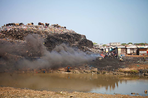 This mountain of plastic and other waste along the Odaw River has become a grazing ground for cattle, giving rise to health concerns