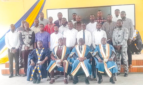 Prof. Kweku Adutwum Ayim Boakye (seated 2nd from left) and other members of faculty with students after the ceremony Prof. Kweku Adutwum Ayim Boakye (seated 2nd from left) and other members of faculty with students after the ceremony