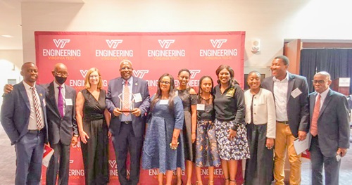 Prof Fred McBagonluri (4th from left), President of Academic City University College, with some friends and family members after the honours Prof Fred McBagonluri (4th from left), President of Academic City University College, with some friends and family members after the honours