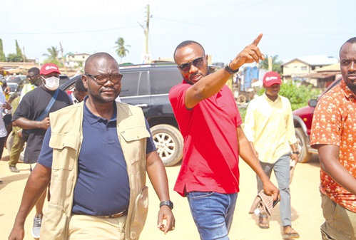 Asenso Boakye (left) being led by Jerry Ahmed Shaib, aspiring MP, Weija Gbawe Constituency, to inspect some ongoing projects. Picture: CALEB VANDERPUYE Asenso Boakye (left) being led by Jerry Ahmed Shaib, aspiring MP, Weija Gbawe Constituency, to inspect some ongoing projects. Picture: CALEB VANDERPUYE