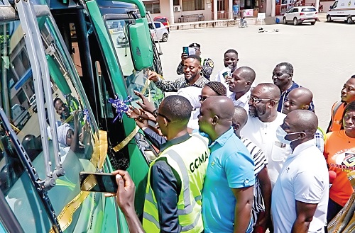 Ambrose Tsegah and Charles Annan, MD for Gapte, cutting the tape to commence the Anyaa service