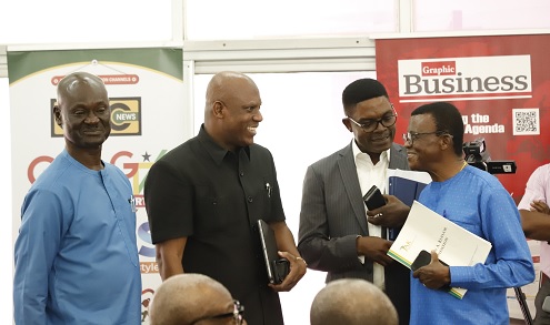 Ato Afful (2nd from left), MD, GCGL, in a chat with Prof. Baffour Agyeman Duah (right) and Dr Emmanuel Akwetey (2nd from right) after the forum. With them is Gabriel Bosompem, member of the NMC