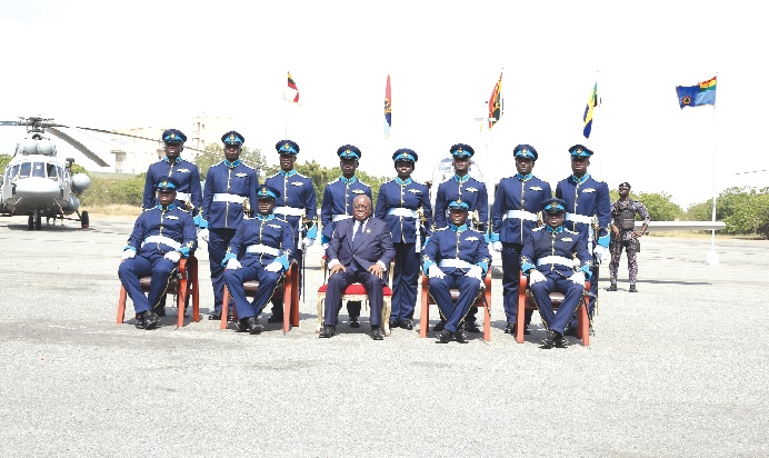 President Nana Akufo Addo (seated middle) with the newly wing pilots. Picture: BENEDICT OBUOBI