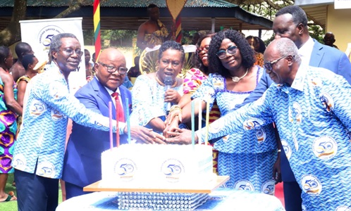 Sophia Gifty Awortwe (with mic), a Council Member, CSU, being assisted by Prof. Aaron Mike Oquaye (2nd from left) to cut the 50th anniversary cake of the CSU. Lending hands include Dr Yaw Osei Adutwum (2nd from right partly covered), Education Minister, Prof. Samuel Kofi Afrane (left), the V.C. of CSU, and Seth Osafo (right), Chairman of Council, CSU. Picture: EMMANUEL BAAH Sophia Gifty Awortwe (with mic), a Council Member, CSU, being assisted by Prof. Aaron Mike Oquaye (2nd from left) to cut the 50th anniversary cake of the CSU. Lending hands include Dr Yaw Osei Adutwum (2nd from right partly covered), Education Minister, Prof. Samuel Kofi Afrane (left), the V.C. of CSU, and Seth Osafo (right), Chairman of Council, CSU. Picture: EMMANUEL BAAH