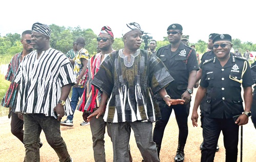 Jacob Dery (left), the MCE for Lawra, and Stephen Yakubu (middle), the Upper West Regional Minister, leading the REGSEC to the flooded area