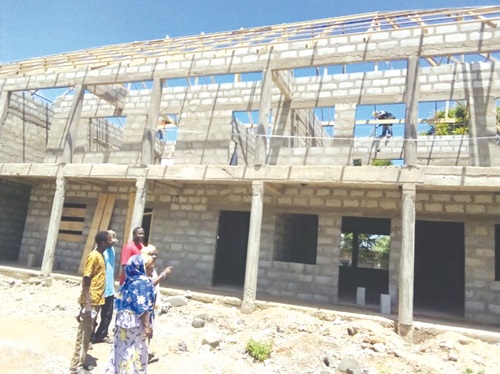 Some of the committee members being conducted round the project Some of the committee members being conducted round the project
