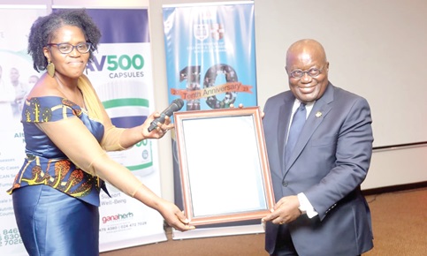 President Akufo-Addo (right), receiving a citation from Dr Emefa Takyi Amoako, Co-Chairman of OXCAM. Picture: SAMUEL TEI ADANO President Akufo-Addo (right), receiving a citation from Dr Emefa Takyi Amoako, Co-Chairman of OXCAM. Picture: SAMUEL TEI ADANO