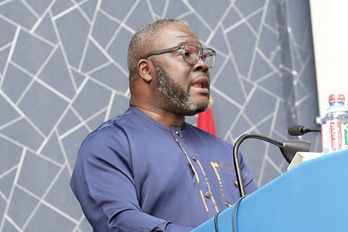 Kwame Baah Acheamfour (left), Director, International Affairs, Ministry of Communications & Digitalisation, addressing participants in the conference Kwame Baah Acheamfour (left), Director, International Affairs, Ministry of Communications & Digitalisation, addressing participants in the conference