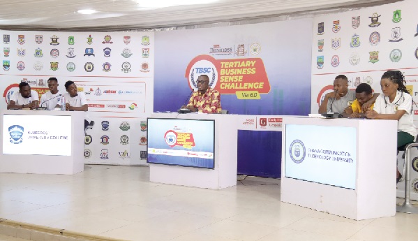 contestants of the Ghana Communication Technology University(GCTU), right, and their opponents from the BlueCrest University College (left) answer questions from the quiz master Alhassan Trawule (middle) Graphic Business TBSC Version 6.0: Legon retains south East zone title —16 Schools qualify for national championship
