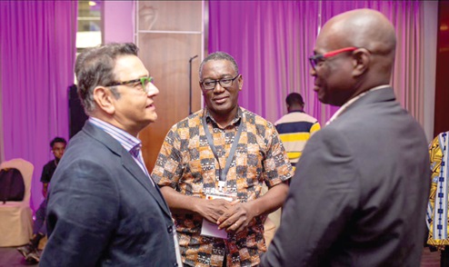 Suraj Shah (left), Head, Strategic Partnerships, Mastercard Foundation, interacting with Olufemi Adewumi (middle), Programmes Director, MEST Africa, and Fakor Disu (right), Deputy Director, Schools and Instructions Division, Ghana Education Service, at the 2024 EdTech Stakeholders Forum