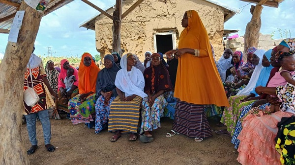 Bukari Barikisu, a member of the mother-to-mother support groups Sharing her experience at a community engagement