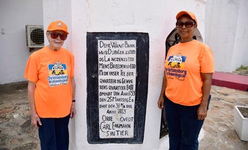Prof. Rachel Ama Asaa Engmann (right) and her mum Dorothy, at the cistern on which is the name, Danish Governor, Cal Gustav Engmann, at the Osu Castle in Accra