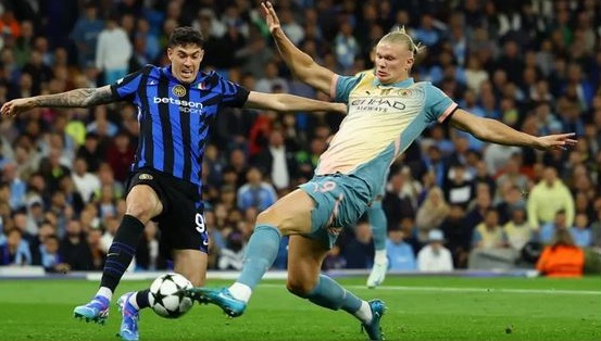 Erling Haaland (right) in action for Manchester City against Inter Milan Erling Haaland (right) in action for Manchester City against Inter Milan
