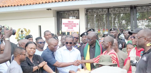 Johnson Asiedu Nketiah (2nd from right), National Chairman, NDC, presenting the petition to the leadership of Parliament
