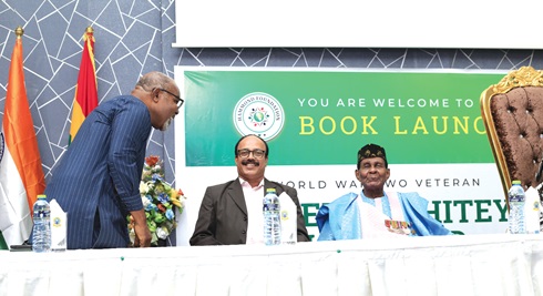 WOI Joseph Ashitey Hammond (right),  and a representative from the Indian High Commission. Pictures: BENEDICT OBUOBI