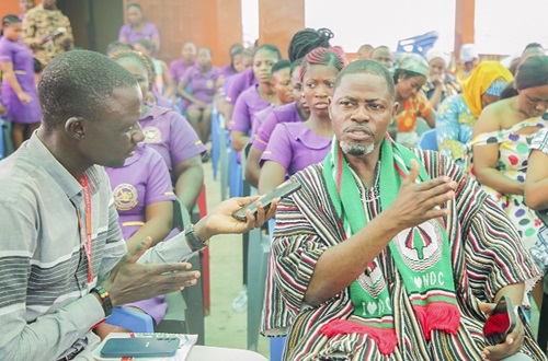 Our reporter speaking to Alfred Kotey Ashie (right), NDC parliamentary candidate for Odododiodioo constituency. Pictures: CALEB VANDERPUYE
