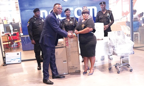Francis Sam (left), Melcom Group General Manager, handing over the items to Superintendent Juliana Obeng (right), Director of Public Affairs of the Greater Accra Regional Police Command Francis Sam (left), Melcom Group General Manager, handing over the items to Superintendent Juliana Obeng (right), Director of Public Affairs of the Greater Accra Regional Police Command