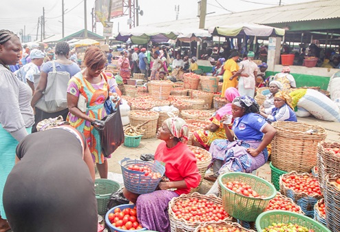  Traders selling on the pedestrian walkway and parts of the roads