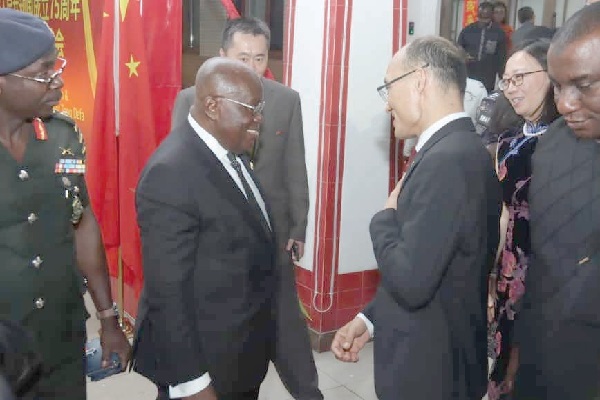 Tong Defa (left), Ambassador People's Republic of China ushering in President Nana Addo Dankwa Akufo-Addo for the celebration of the 75th anniversary of People's Republic of China. Picture: ELVIS NII NOI DOWUONA China, Ghana trade volume hits $6billion in H1